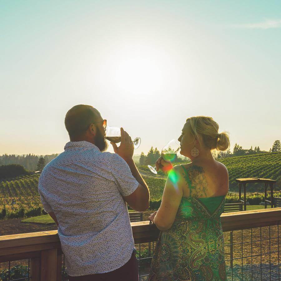 Sipping wine on the Mediterranean Vineyards deck